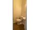 Clean and updated half bathroom with wood-look flooring at 539 Greyhawk Way, Fairburn, GA 30213
