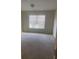 Spacious bedroom with carpeted floor and window at 539 Greyhawk Way, Fairburn, GA 30213