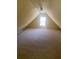 Large bedroom with carpeted floor and window at 539 Greyhawk Way, Fairburn, GA 30213