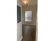 Simple bedroom with wood flooring and a window with blinds at 539 Greyhawk Way, Fairburn, GA 30213