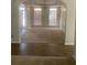 Formal dining room with hardwood floors and neutral colors at 539 Greyhawk Way, Fairburn, GA 30213