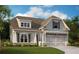 Two-story house with gray siding, stone accents, and a three-car garage at 53 Colonial Ter, Villa Rica, GA 30180