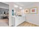 Double vanity bathroom with white cabinets and a view of the bedroom at 211 Sanctuary Dr, Mcdonough, GA 30253