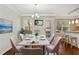 Bright dining room with hardwood floors, and access to the kitchen at 2179 Mainsail Dr, Marietta, GA 30062