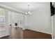 Formal dining room with hardwood floors and a view of the living room at 2179 Mainsail Dr, Marietta, GA 30062