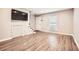 Bright living room featuring wood-look floors and staircase at 3119 Colonial Way # I, Atlanta, GA 30341