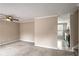 Open living room with view into kitchen area at 3265 Newcastle Way, Snellville, GA 30039