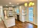 Modern kitchen with granite countertops and stainless steel appliances at 1504 Sycamore Nw Dr, Kennesaw, GA 30152