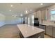 Modern kitchen with gray cabinets and quartz countertops at 112 Dalston Cv, Stockbridge, GA 30281