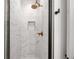 Walk-in shower with marble tile and modern fixtures at 698 Eustace Se St, Atlanta, GA 30315