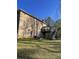 Large backyard with a deck and mature trees at 4365 Miners Creek Rd, Lithonia, GA 30038