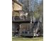 Elevated deck with stairs, railings, and a shaded pergola at 4365 Miners Creek Rd, Lithonia, GA 30038