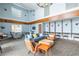 Bright and airy common area with seating and workspaces at 860 Peachtree Ne St # 1008, Atlanta, GA 30308