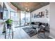 Modern living room boasts city views and hardwood floors at 860 Peachtree Ne St # 808, Atlanta, GA 30308