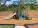 playground with modern equipment and safety surfacing at 96 Silverton Dr, Dacula, GA 30019