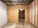 Unfinished basement with partially finished walls and a door to the mechanicals at 544 Eagles Nest Cir, Carrollton, GA 30116