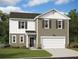 Two-story house with gray siding, white accents, and a two-car garage at 86 Silverton Dr, Dacula, GA 30019