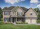 Two-story brick house with a large front yard, two-car garage, and attractive landscaping at 3260 Lions Ruby Ln, Atlanta, GA 30349