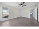 Bright bedroom with ceiling fan and view of kitchen at 4628 Rolling Brook Ct, Union City, GA 30291