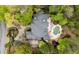 Luxury home with a large backyard, pool, and lush landscaping at 6092 Carlisle Ln, Alpharetta, GA 30022