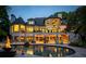 Luxury home with a beautiful pool and patio, perfect for entertaining at 6092 Carlisle Ln, Alpharetta, GA 30022