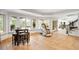 Relaxing basement with a massage chair, small table and pool view at 6092 Carlisle Ln, Alpharetta, GA 30022