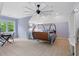 Bedroom with unique circular bed, desk and window seat at 6092 Carlisle Ln, Alpharetta, GA 30022