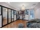 Walk in closet with mirrored doors and custom shelving at 6092 Carlisle Ln, Alpharetta, GA 30022