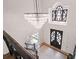 Grand entryway with crystal chandelier and elegant staircase at 6092 Carlisle Ln, Alpharetta, GA 30022