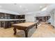 Basement game room with pool table and wet bar at 6092 Carlisle Ln, Alpharetta, GA 30022