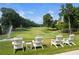Four chairs overlooking a golf course at 6092 Carlisle Ln, Alpharetta, GA 30022