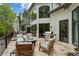Outdoor patio with seating area, fire pit, and built-in grill at 6092 Carlisle Ln, Alpharetta, GA 30022