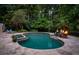 Inviting pool with fire features and spacious patio at 6092 Carlisle Ln, Alpharetta, GA 30022
