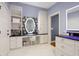 Elegant bathroom vanity with a large mirror and storage at 6092 Carlisle Ln, Alpharetta, GA 30022