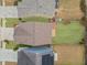 Aerial view showing a townhome with a backyard and solar panels at 7167 Rigel Sw Bnd, Atlanta, GA 30331