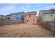 Backyard view of house with deck at 7167 Rigel Sw Bnd, Atlanta, GA 30331