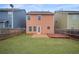 Backyard view of house with deck at 7167 Rigel Sw Bnd, Atlanta, GA 30331