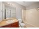 Clean bathroom with single vanity and bathtub shower combo at 7167 Rigel Sw Bnd, Atlanta, GA 30331