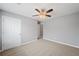 Bedroom with ceiling fan and spacious closet at 7167 Rigel Sw Bnd, Atlanta, GA 30331