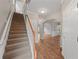 Two-story home with hardwood floors and a staircase at 7167 Rigel Sw Bnd, Atlanta, GA 30331