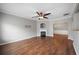 Spacious living room with hardwood floors, fireplace and view to dining room at 7167 Rigel Sw Bnd, Atlanta, GA 30331