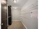 Large walk-in closet with wire shelving and double hanging rods at 7167 Rigel Sw Bnd, Atlanta, GA 30331