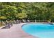 Inviting pool with surrounding patio and lounge chairs at 5917 N Helton Rd, Villa Rica, GA 30180