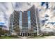 Curved glass highrise building with landscaped grounds at 700 Park Regency Ne Pl # 1306, Atlanta, GA 30326