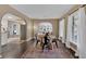 Spacious dining area with dark hardwood floors and a rustic table at 2144 Kennesaw Due West Nw Rd, Kennesaw, GA 30152