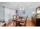 Charming dining room with hardwood floors and light blue walls at 484 Coolsprings Trl, Woodstock, GA 30188