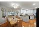 Bright kitchen with island and dining area at 484 Coolsprings Trl, Woodstock, GA 30188