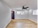 Bright bedroom with hardwood floors and ceiling fan at 6685 Buckhurst Trl, Atlanta, GA 30349