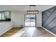 Modern dining area with hardwood floors and sliding glass doors to the deck at 6685 Buckhurst Trl, Atlanta, GA 30349