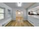 Bright dining room with hardwood floors and an open concept design at 6685 Buckhurst Trl, Atlanta, GA 30349